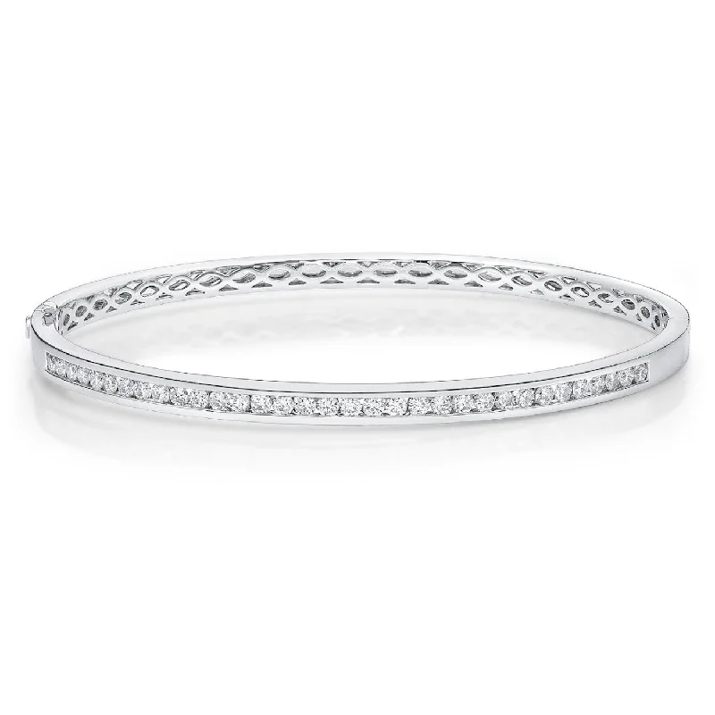 Ladies bracelets polished gemstone designs-Memoire 18k White Gold Channel Set Diamond Bangle Bracelet