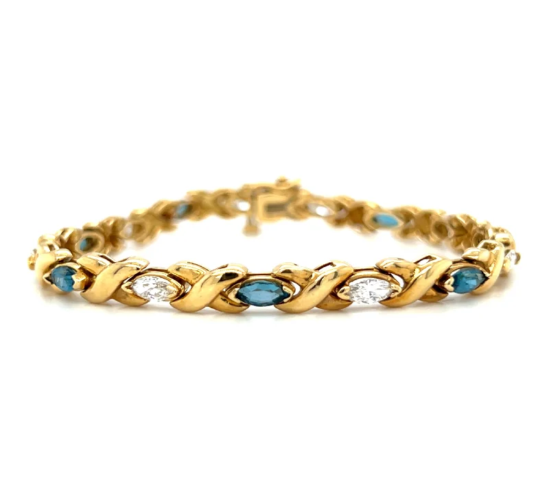 Ladies bracelets cascading stone bracelets-Pre-Owned 18k Yellow Gold Marquise London Blue Topaz & Diamond X Link Bracelet