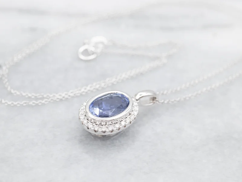 Ladies necklaces top jewelry brands-Bezel Set Sapphire Halo Pendant Necklace